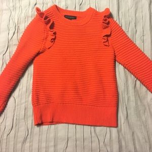 Bright orange ruffle sweater